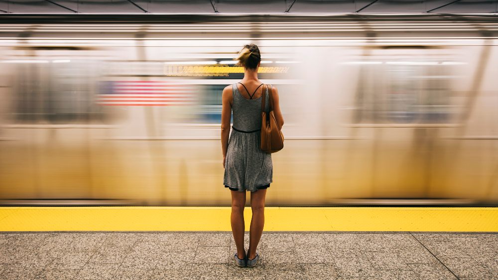 Lady on subway platform - transport security
